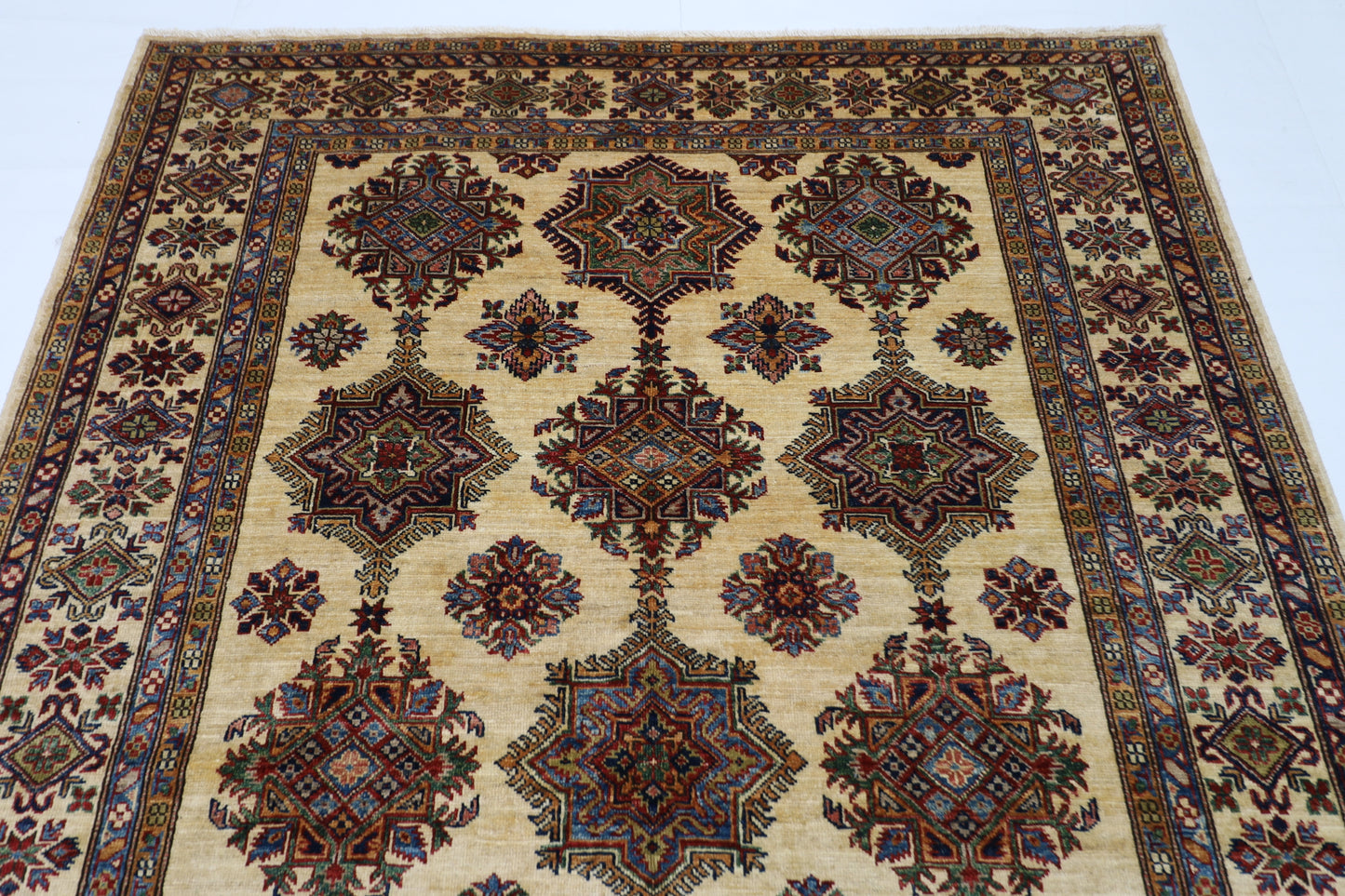 173 x 242 cm | Kazak Beige Afghan Hand Knotted Carpet