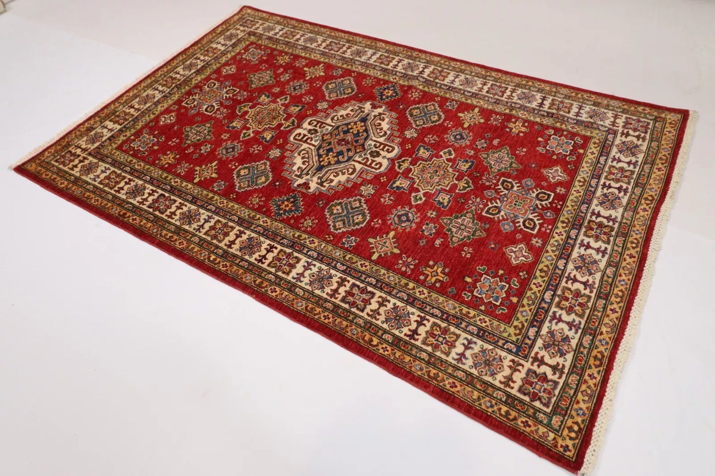 150 x 224 cm | Kazak Afghan Tribal Hand Knotted Veg Dye Wool Carpet