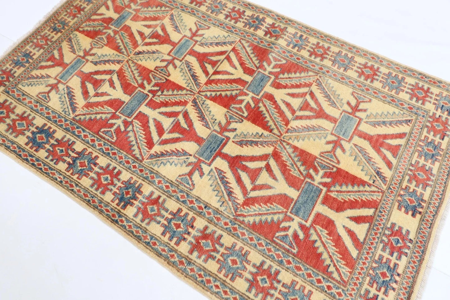 115 x 180 cm | Kazak Afghan Tribal Hand Knotted Veg Dye Wool carpet