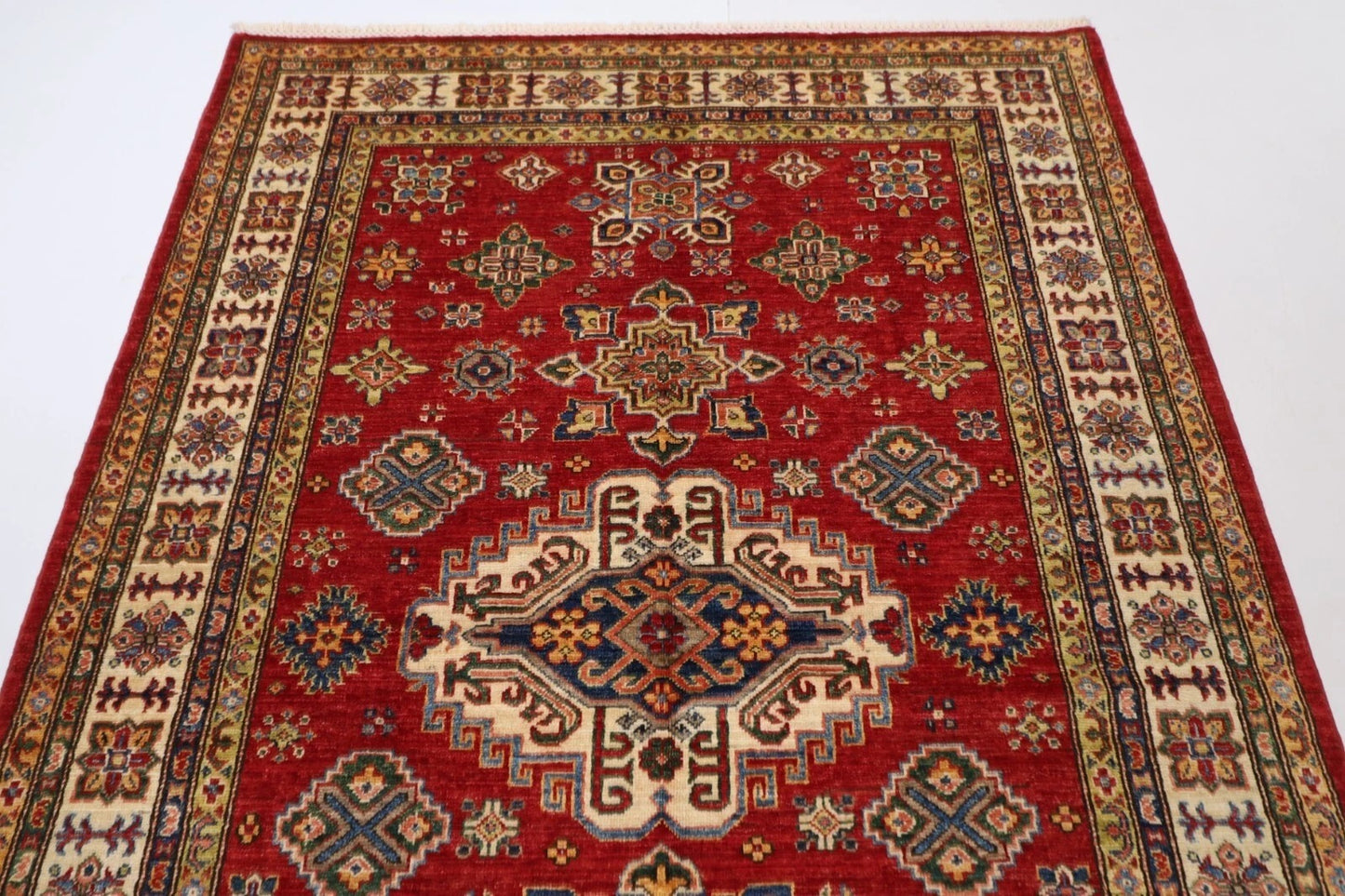 150 x 224 cm | Kazak Afghan Tribal Hand Knotted Veg Dye Wool Carpet