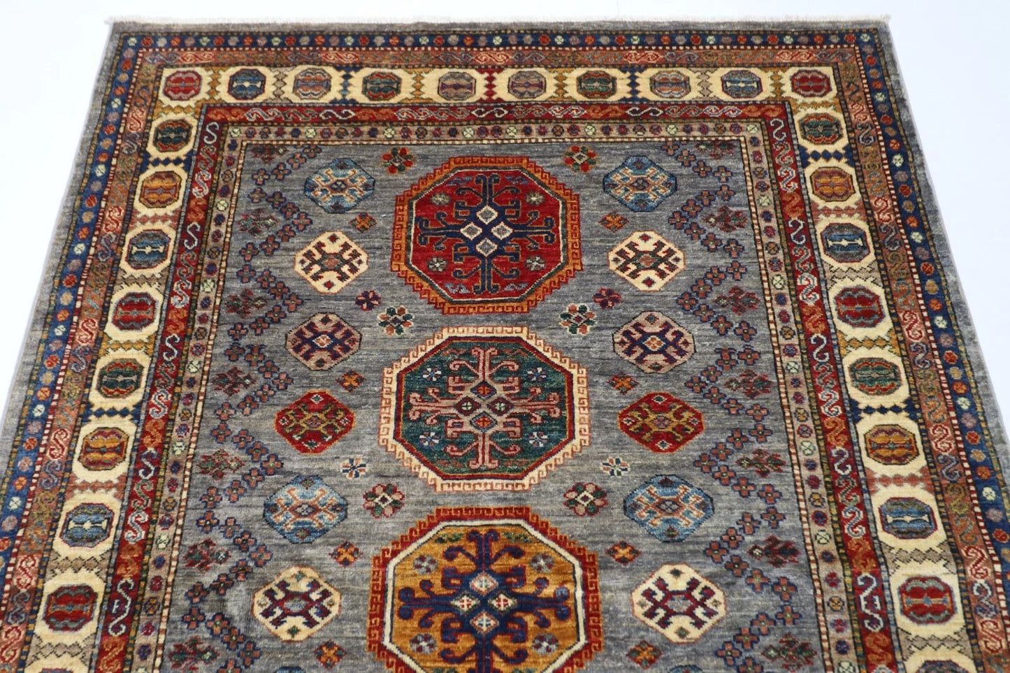 150 x 208 cm | Kazak Afghan Tribal Hand Knotted Veg Dye Wool carpet
