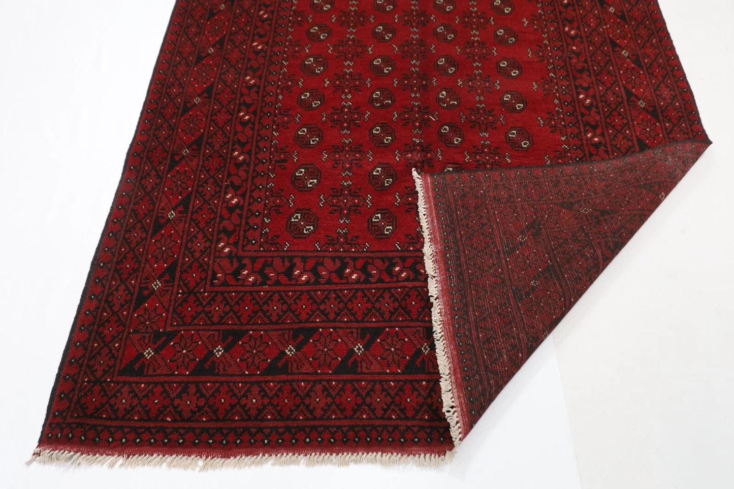 168 x 244 cm | Akja Bokhara Afghan Tribal Hand Knotted Veg Dye Wool Carpet