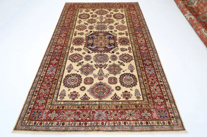 183 x 277 cm |  Geometric Kazak Beige Afghan Tribal Hand Knotted Veg Dye Wool carpet