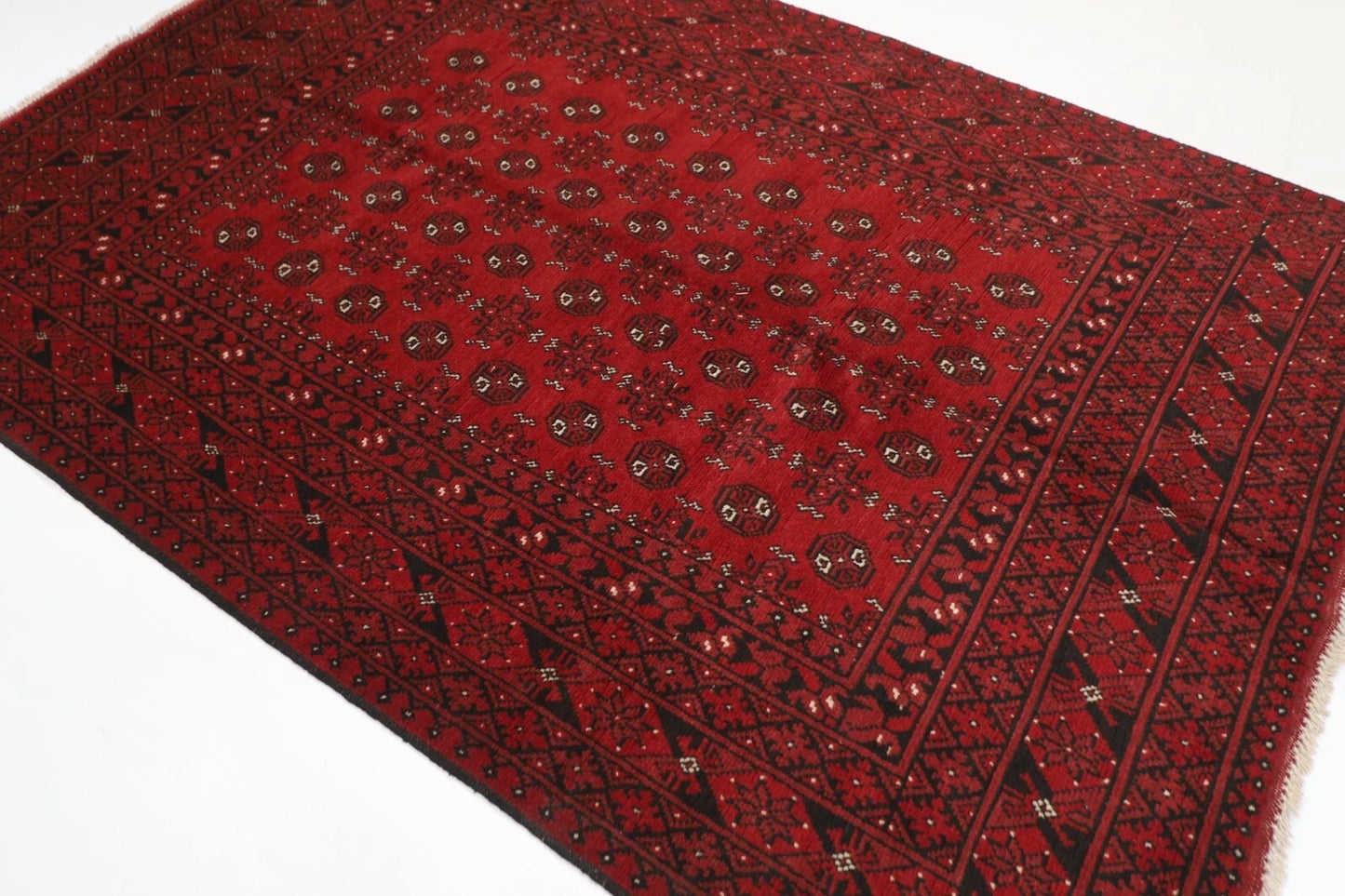168 x 244 cm | Akja Bokhara Afghan Tribal Hand Knotted Veg Dye Wool Carpet