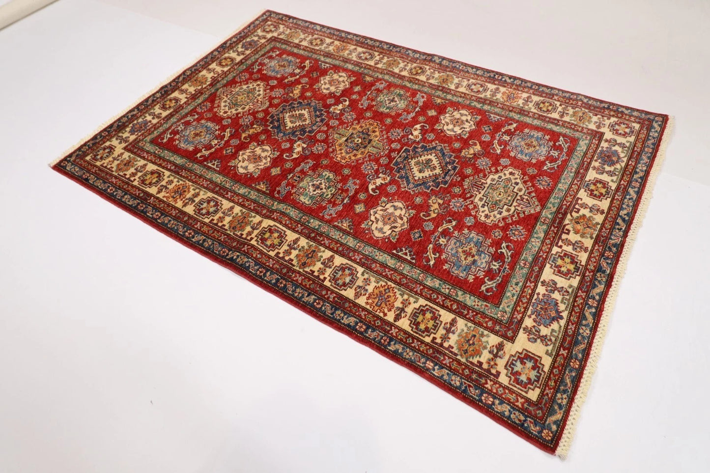149 x 208 cm | Kazak Afghan Tribal Hand Knotted Veg Dye Wool Carpet