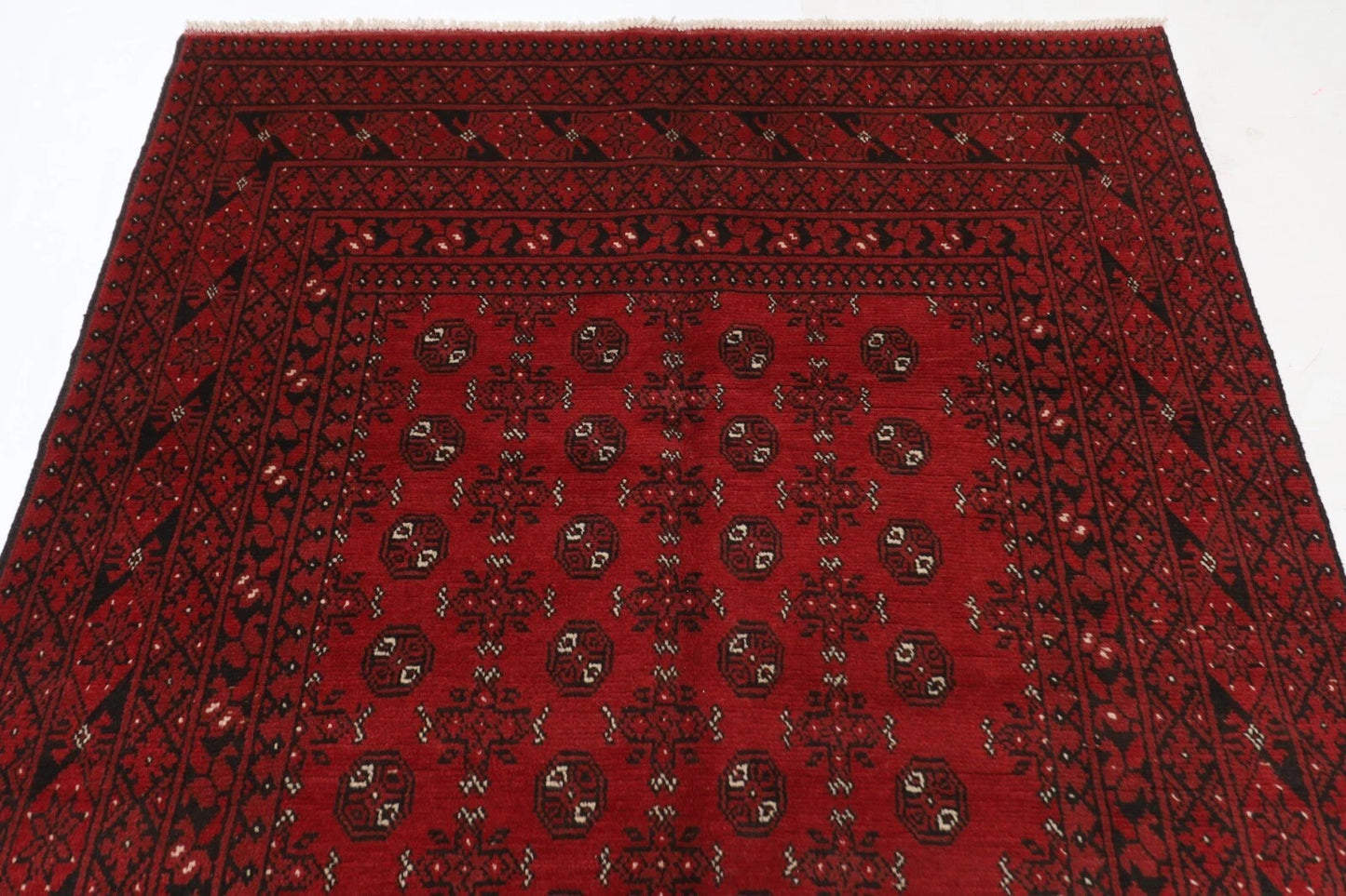 168 x 244 cm | Akja Bokhara Afghan Tribal Hand Knotted Veg Dye Wool Carpet
