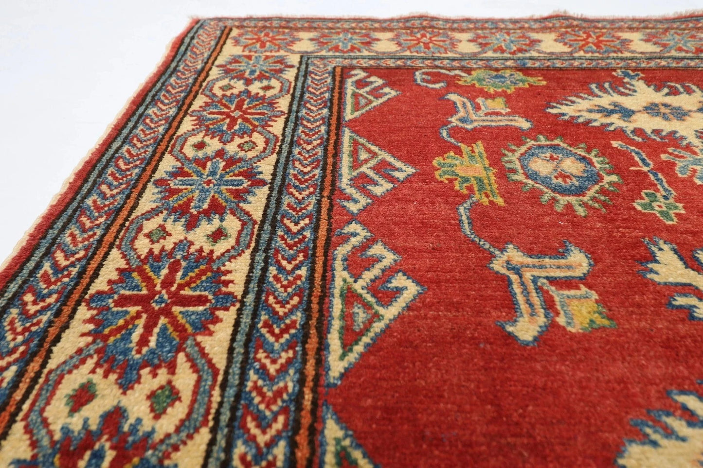 122 x 176 cm | Kazak Afghan Tribal Hand Knotted Veg Dye Wool carpet