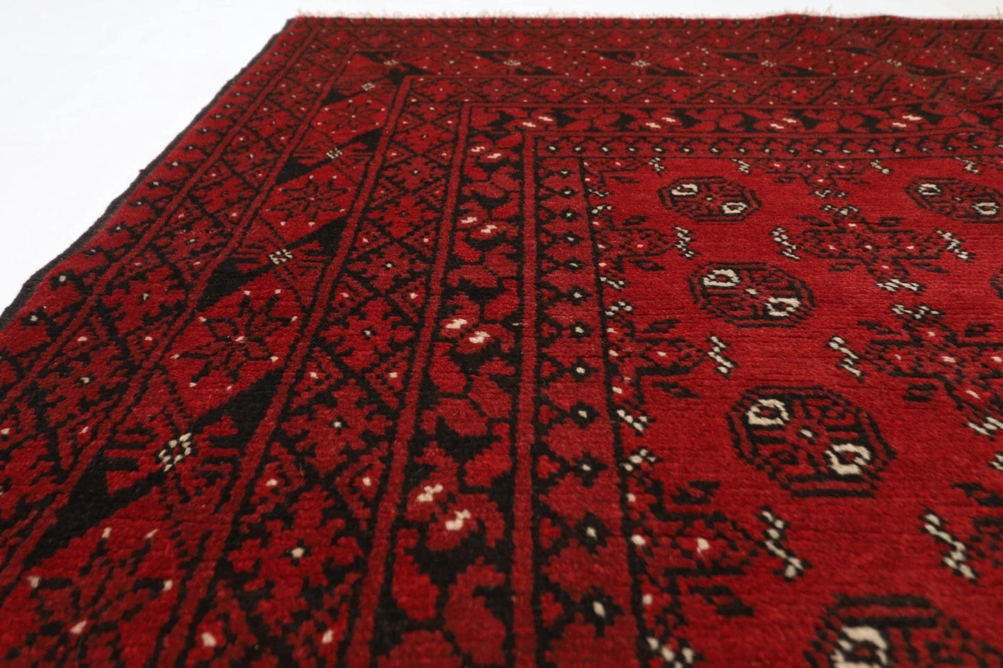 168 x 244 cm | Akja Bokhara Afghan Tribal Hand Knotted Veg Dye Wool Carpet
